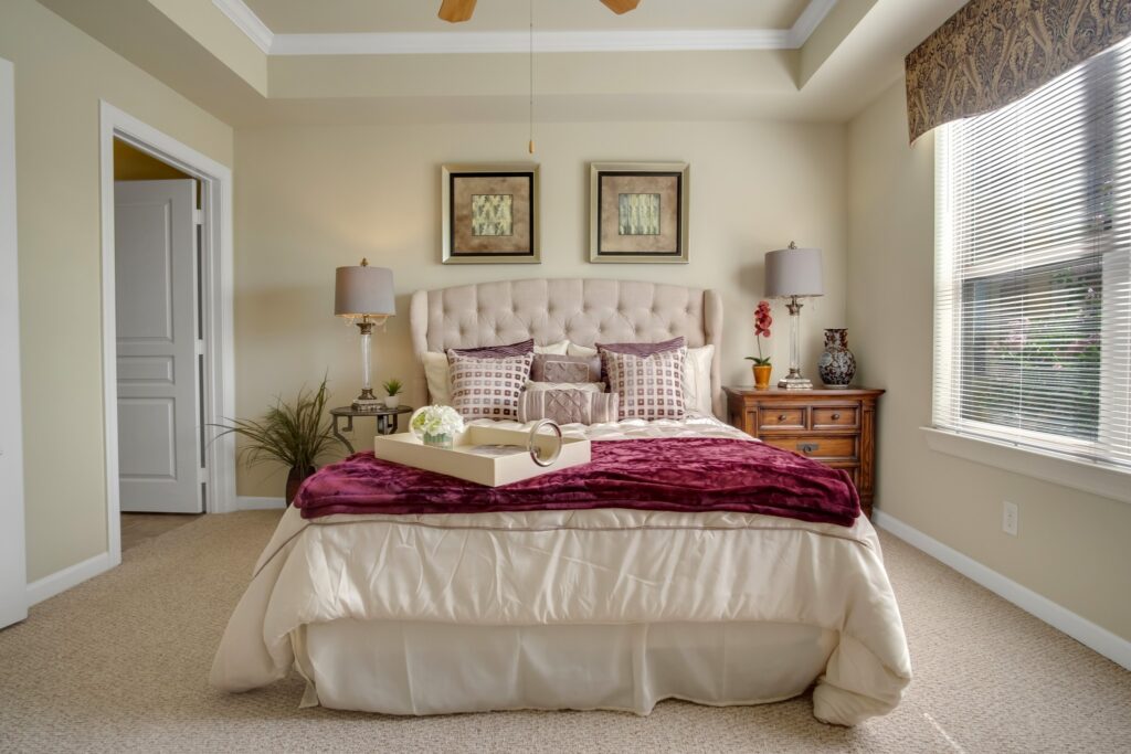 Interior image of a resident's bedroom at The Landon at Lake Highlands, a Forest Hills senior living option.